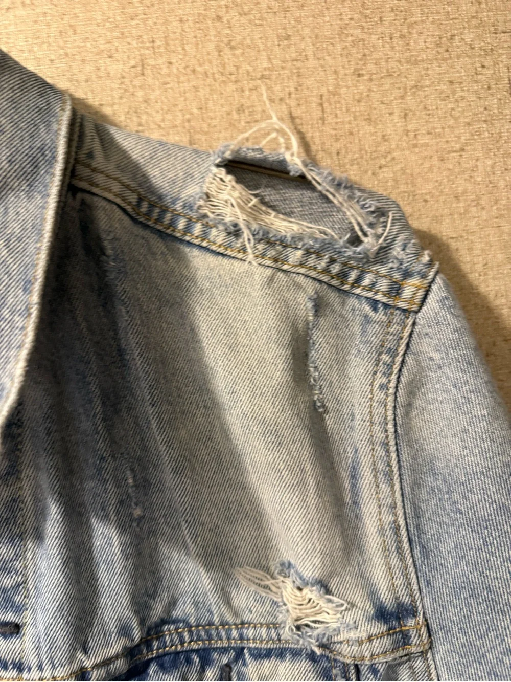 Levi's Light Wash Distressed Denim Trucker Jacket - Men's size Large